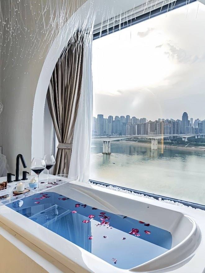 Luxury bathroom with a skyline view over the Chongqing rivers