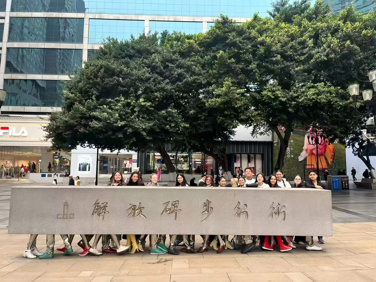 An Anjia tour group at the Yangtze Cableway during a festive lion dance