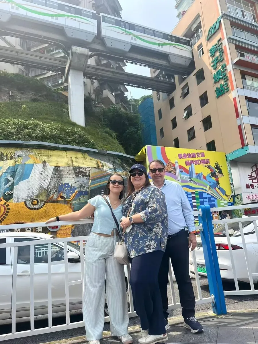 Anjia guests at Liziba where the monorail passes through a building