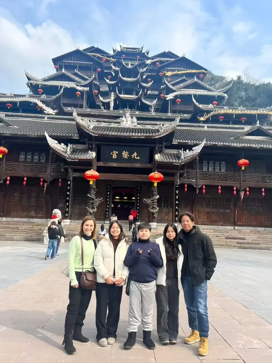 A family on an Anjia trip at Chiyou Jiuli City in Pengshui near Chongqing