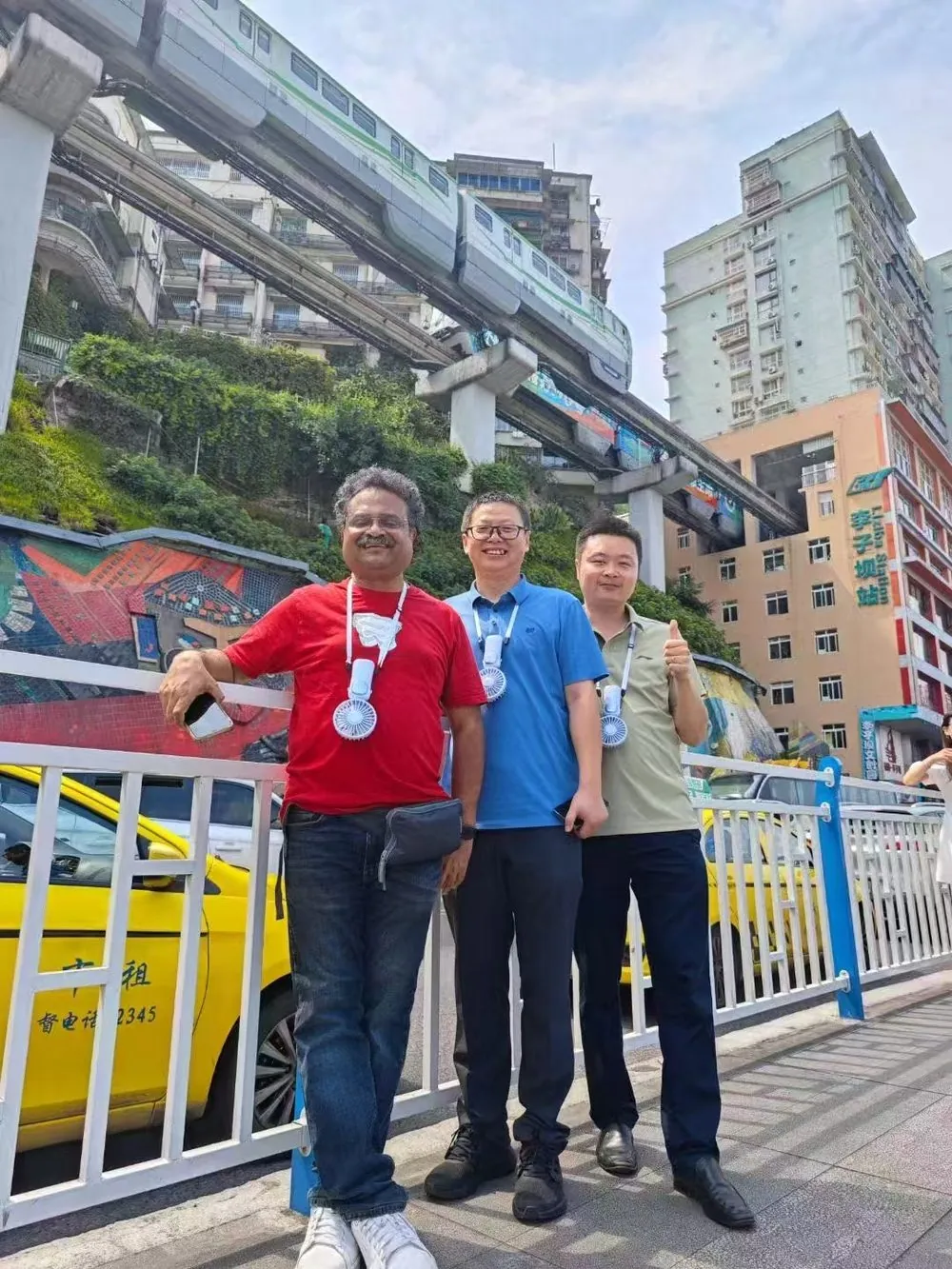 Anjia travellers at the Chongqing riverside skyline